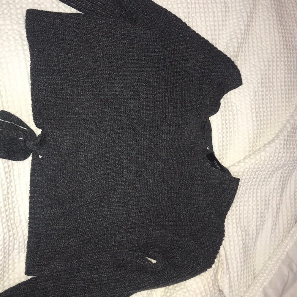 grey sweater with braided bow in the back